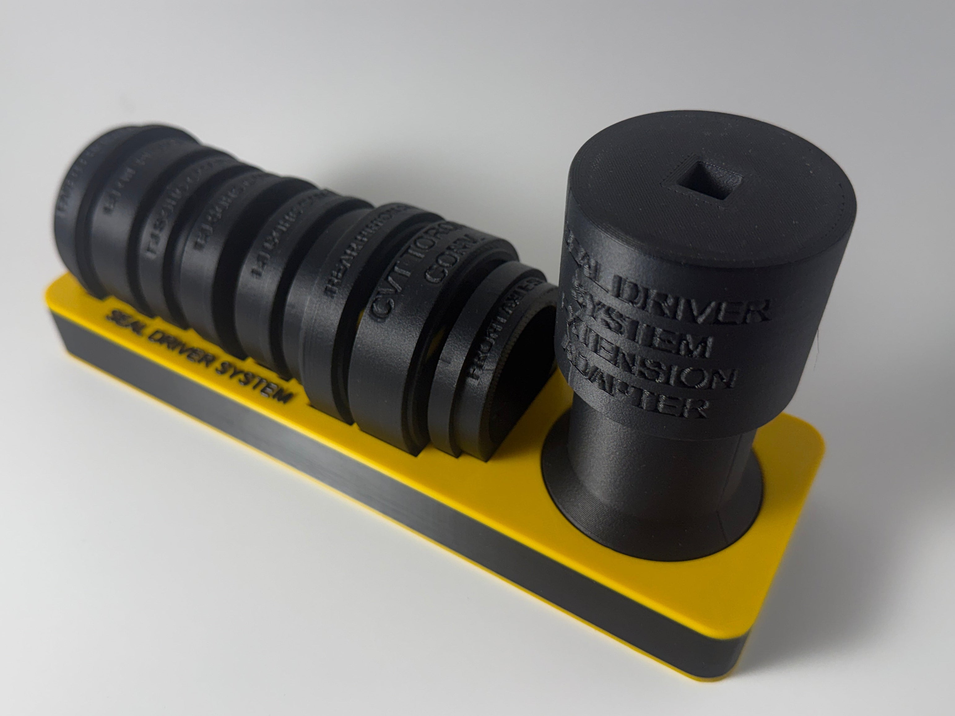 Subaru Seal Driver System. Blemishes With Yellow Tray.